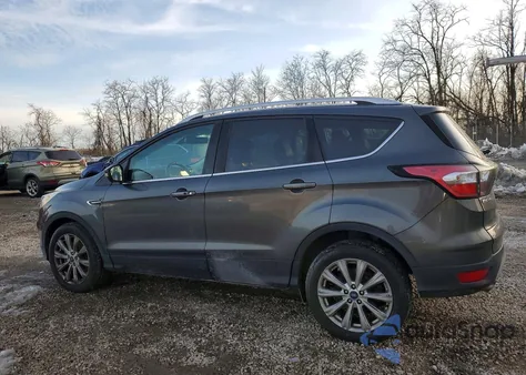 2017 Ford Escape Titanium z USA, uszkodzony, nr VIN 1FMCU9JDXHUE33011